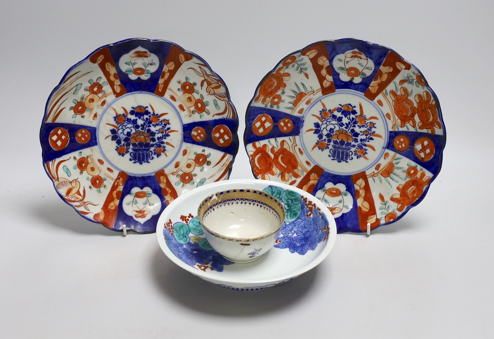 Two Japanese Imari dishes 22cms diameter, a Nabeshima style bowl and a Chinese tea bowl